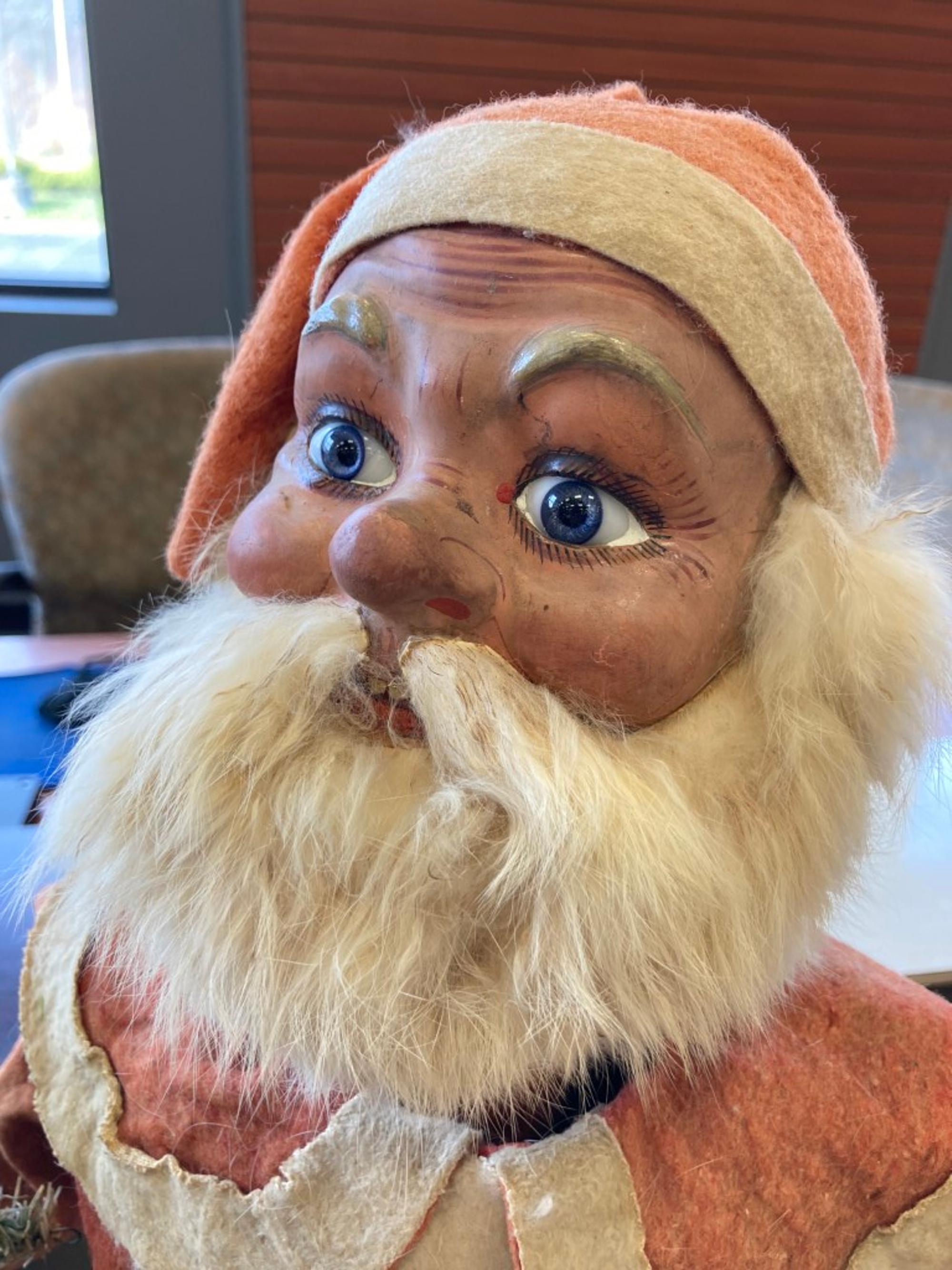 A Wind-Up Santa Claus Nodder