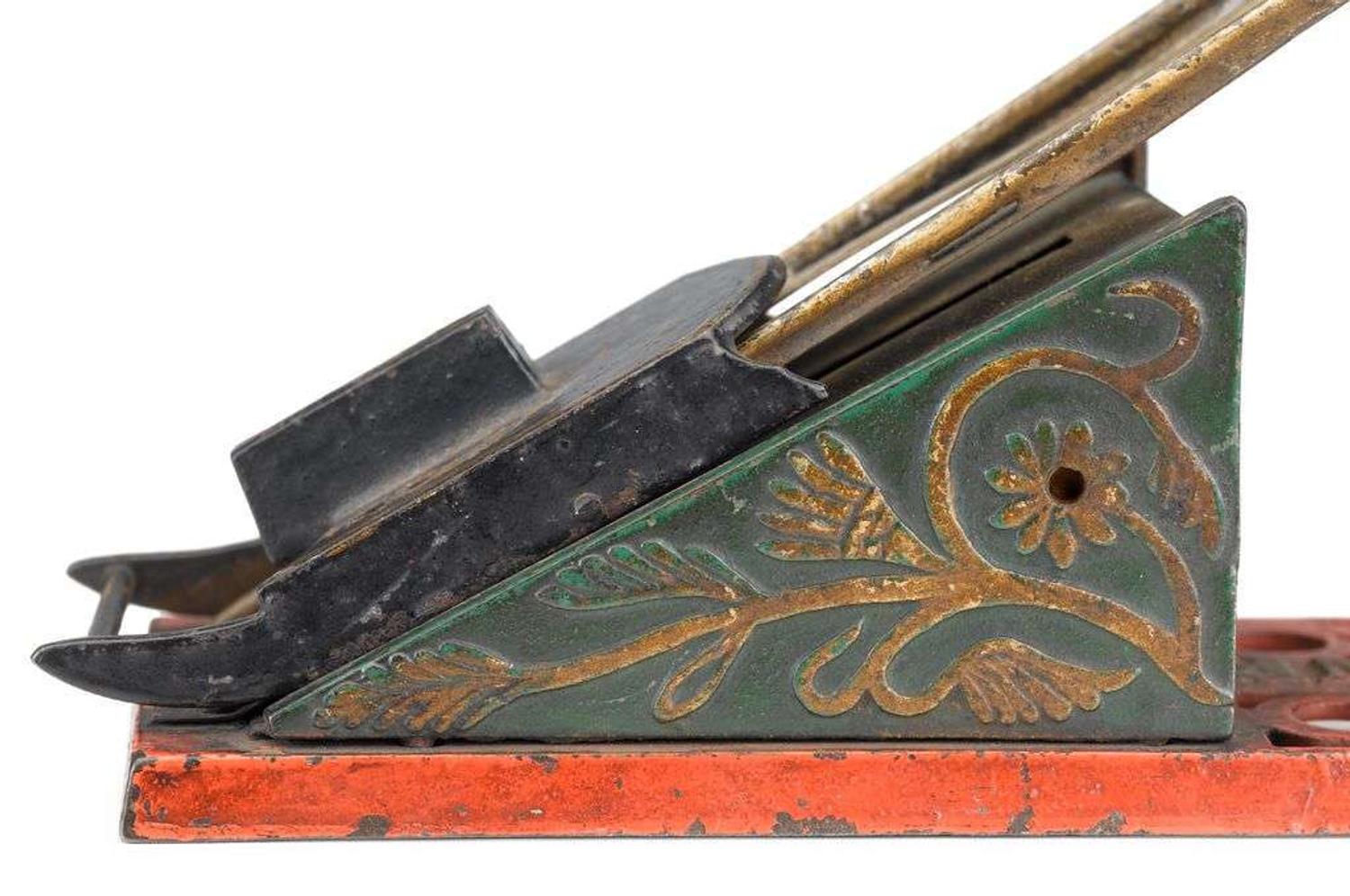 An extremely rare painted cast iron and lead mechanical "Coasting Bank" design attributed to charles a. bailey (1848-1926) for j. & e. stevens co., cromwell