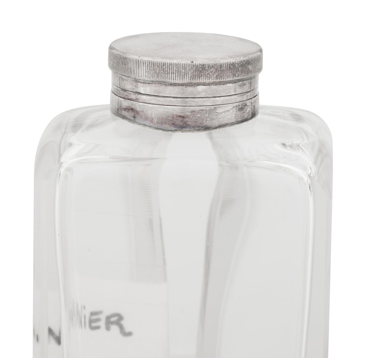 Seven Silver and Silver-Plate Mounted Glass Decanters