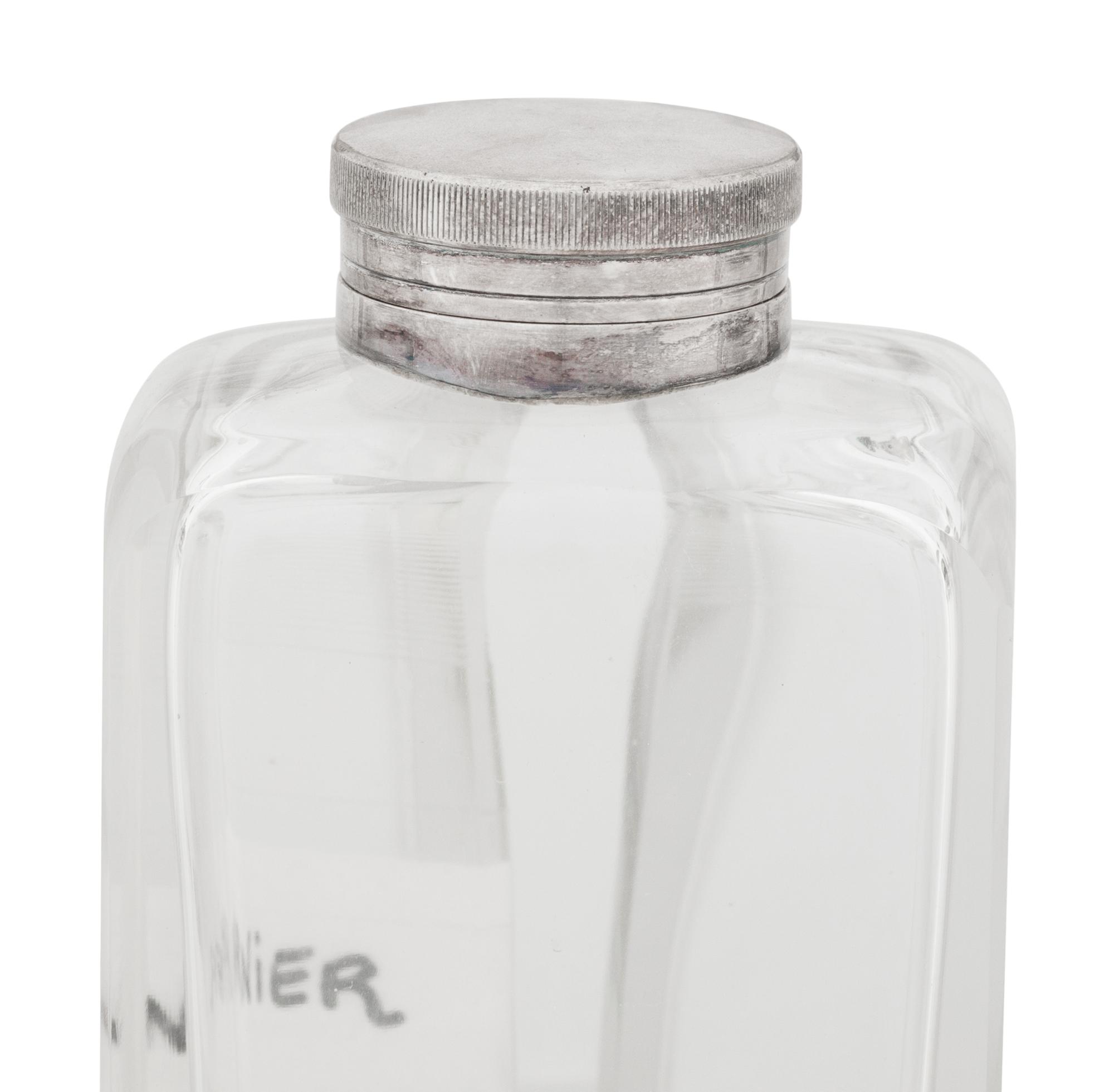 Seven Silver and Silver-Plate Mounted Glass Decanters