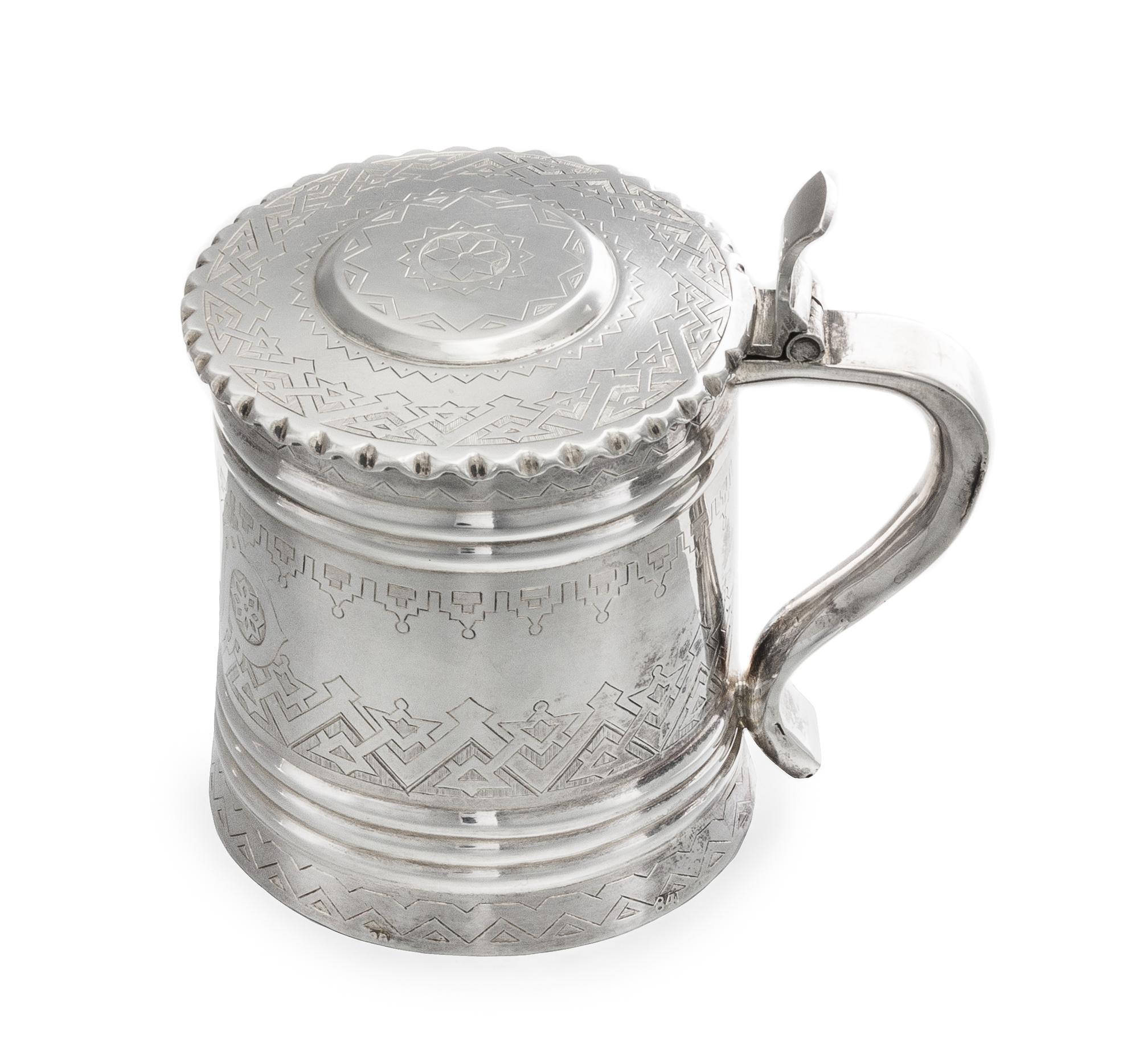 A Russian Silver Children's Tankard, Mark of Sergei Orlov, Assay Mark A.K., Moscow, 1879, the lid and body with engraved geometric deco