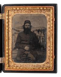[CIVIL WAR]. Quarter plate tintype of a grizzled soldier posed before painted camp backdrop.