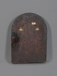 A Carved Walnut Ship Board Panel of a Sailor
