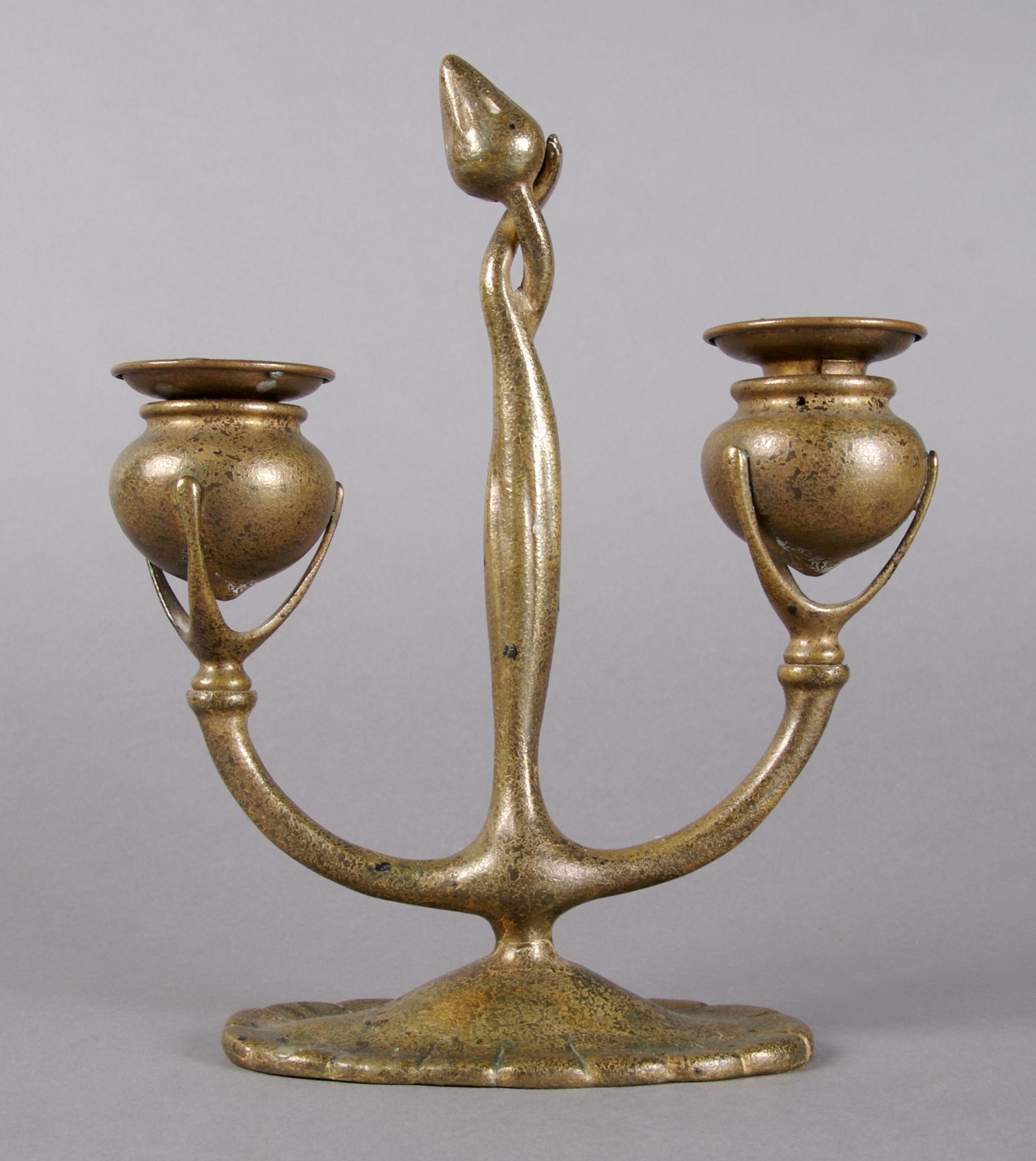 A Tiffany Studios Bronze Two-Light Candelabra, Height 9 inches.