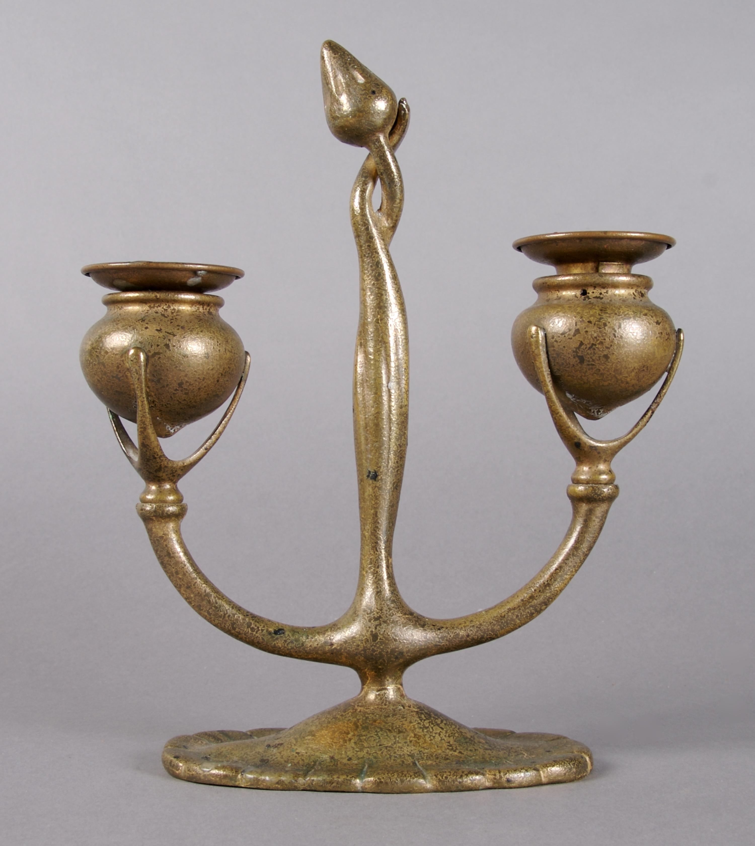 A Tiffany Studios Bronze Two-Light Candelabra, Height 9 inches.