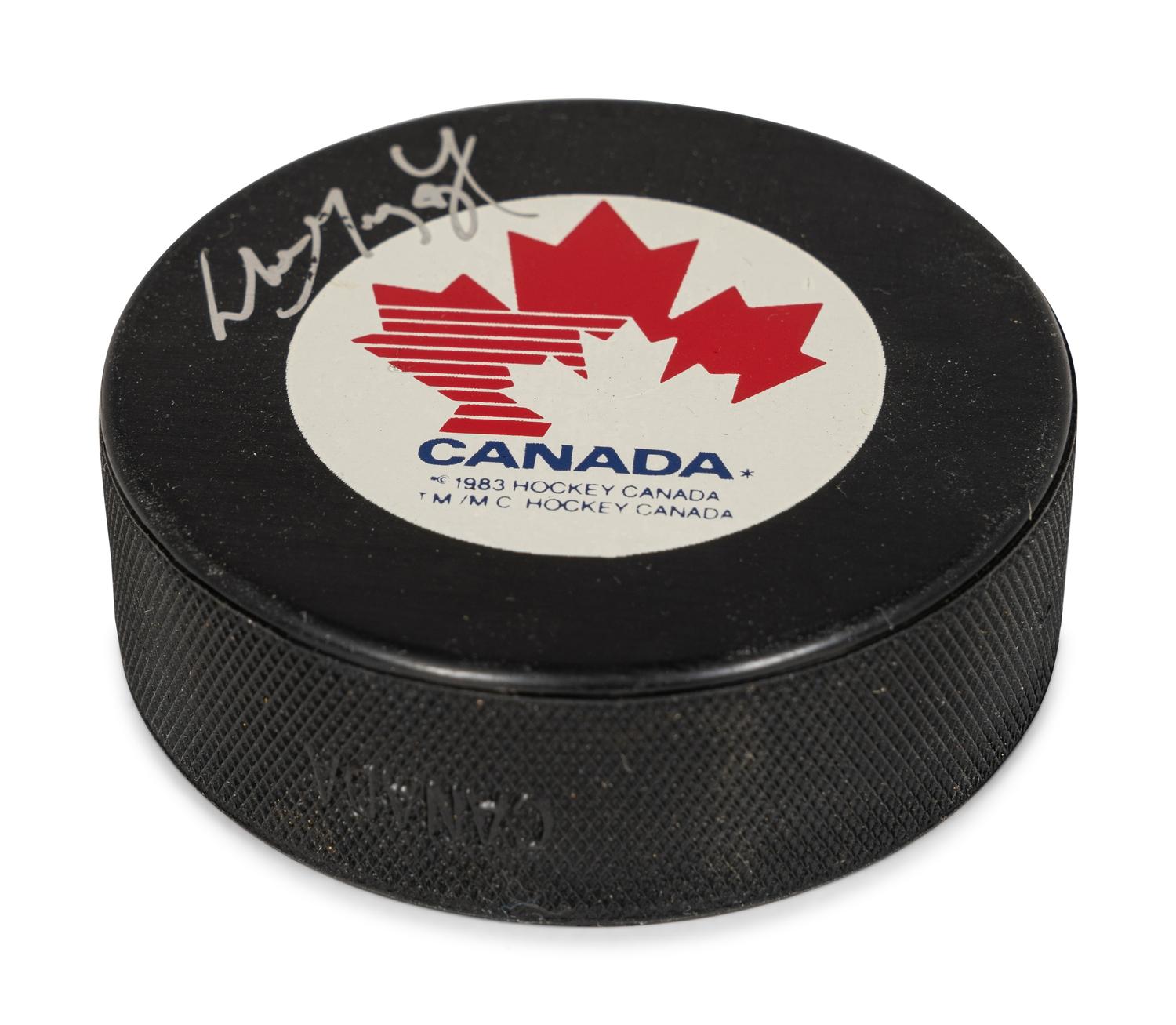 A Wayne Gretzky Signed Autograph Canada Hockey Puck (Beckett Authentication Services Letter BAS Certified),