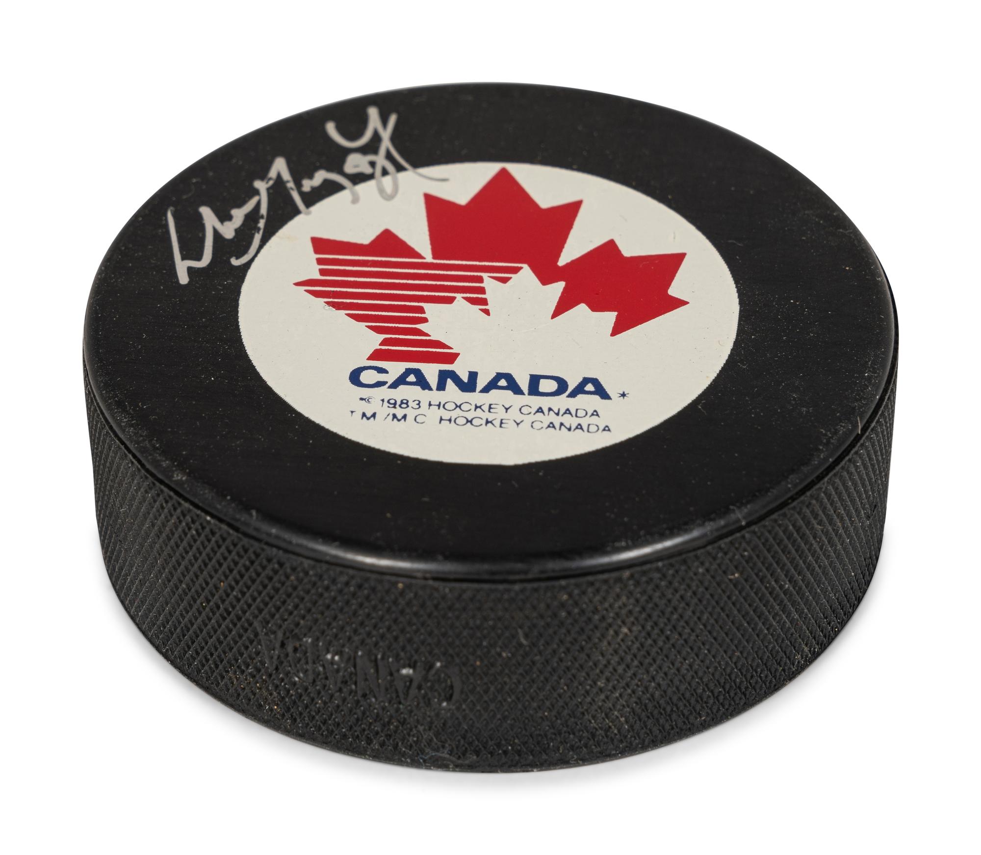 A Wayne Gretzky Signed Autograph Canada Hockey Puck (Beckett Authentication Services Letter BAS Certified),