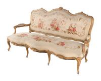 A Louis XV Style Giltwood Seven-Piece Salon Suite
