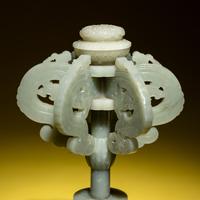 A Chinese Celadon Jade Hat Stand, 19th Century — 清晚期 青玉鏤雕夔龍紋冠架