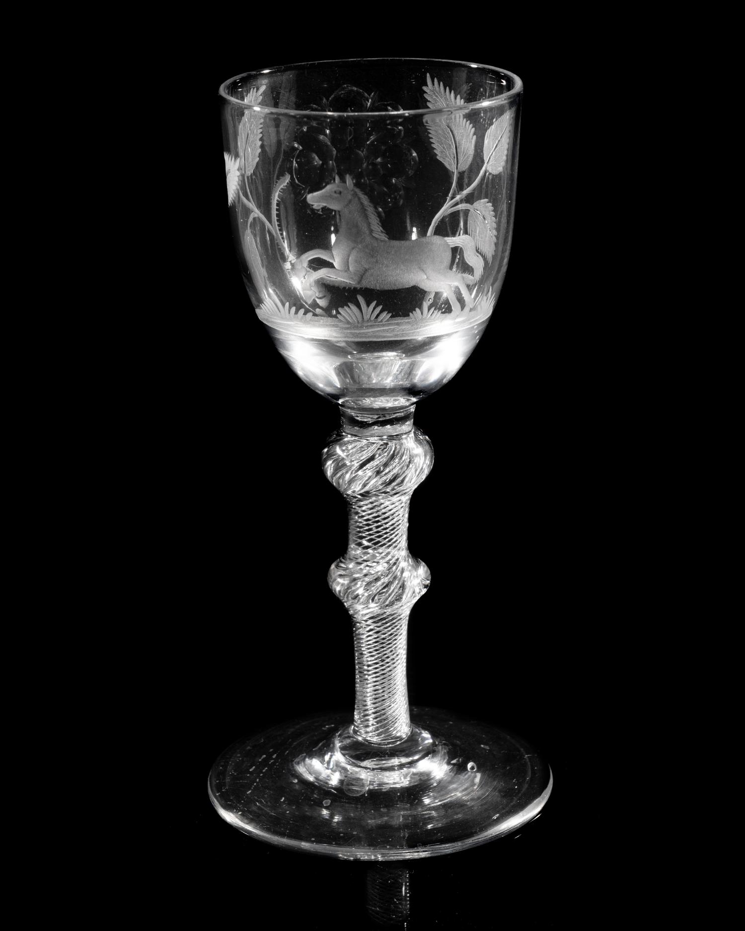 A Hanoverian Engraved Air Twist Wine Glass