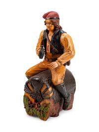 A Dutch Carved and Polychromed Figure of a Man Astride a Wine Barrel
