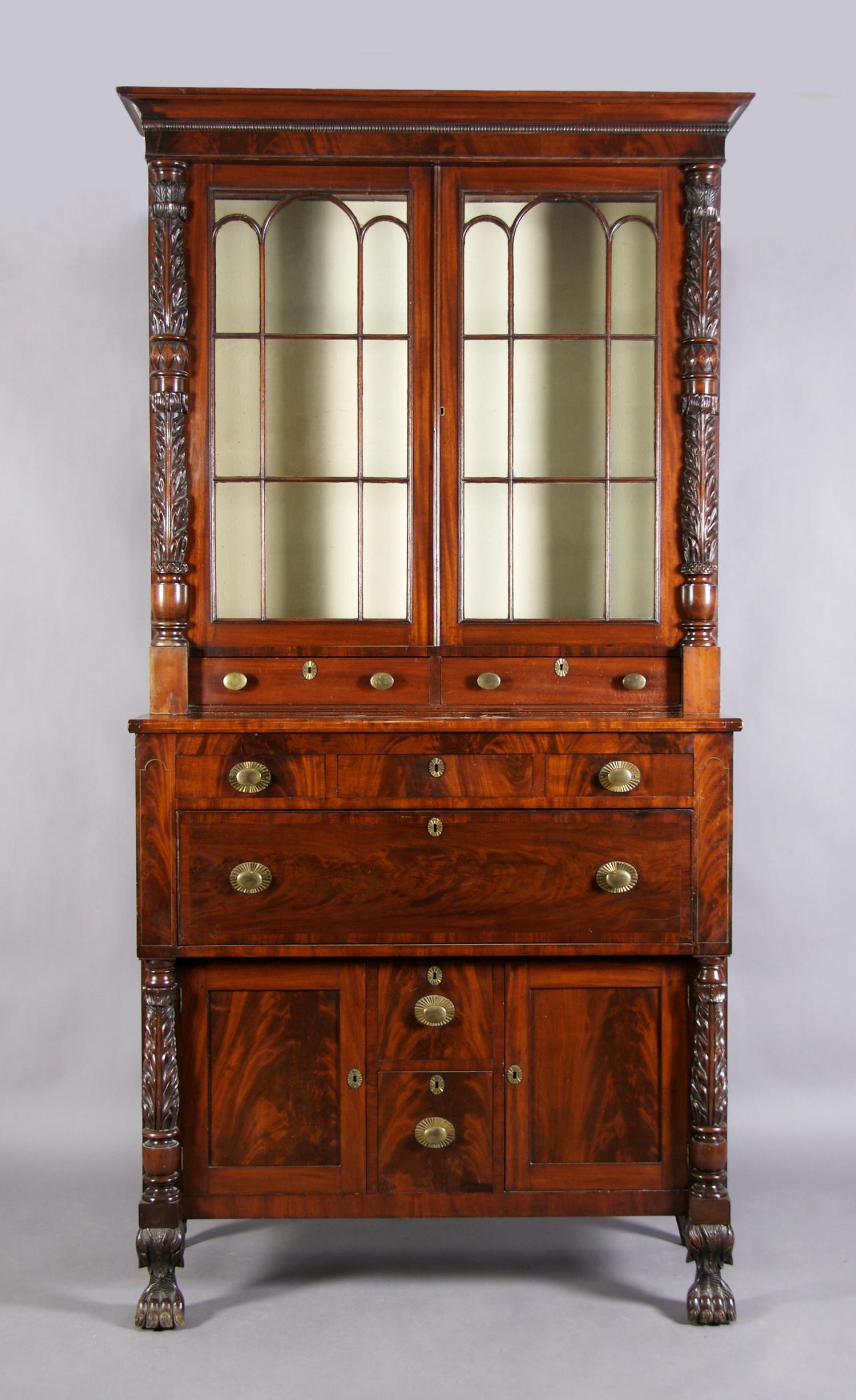 An American Mahogany Federal Secretary Bookcase, Height 100 x width 49 x depth 21 1/2 inches.