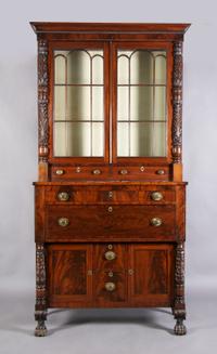 An American Mahogany Federal Secretary Bookcase, Height 100 x width 49 x depth 21 1/2 inches.