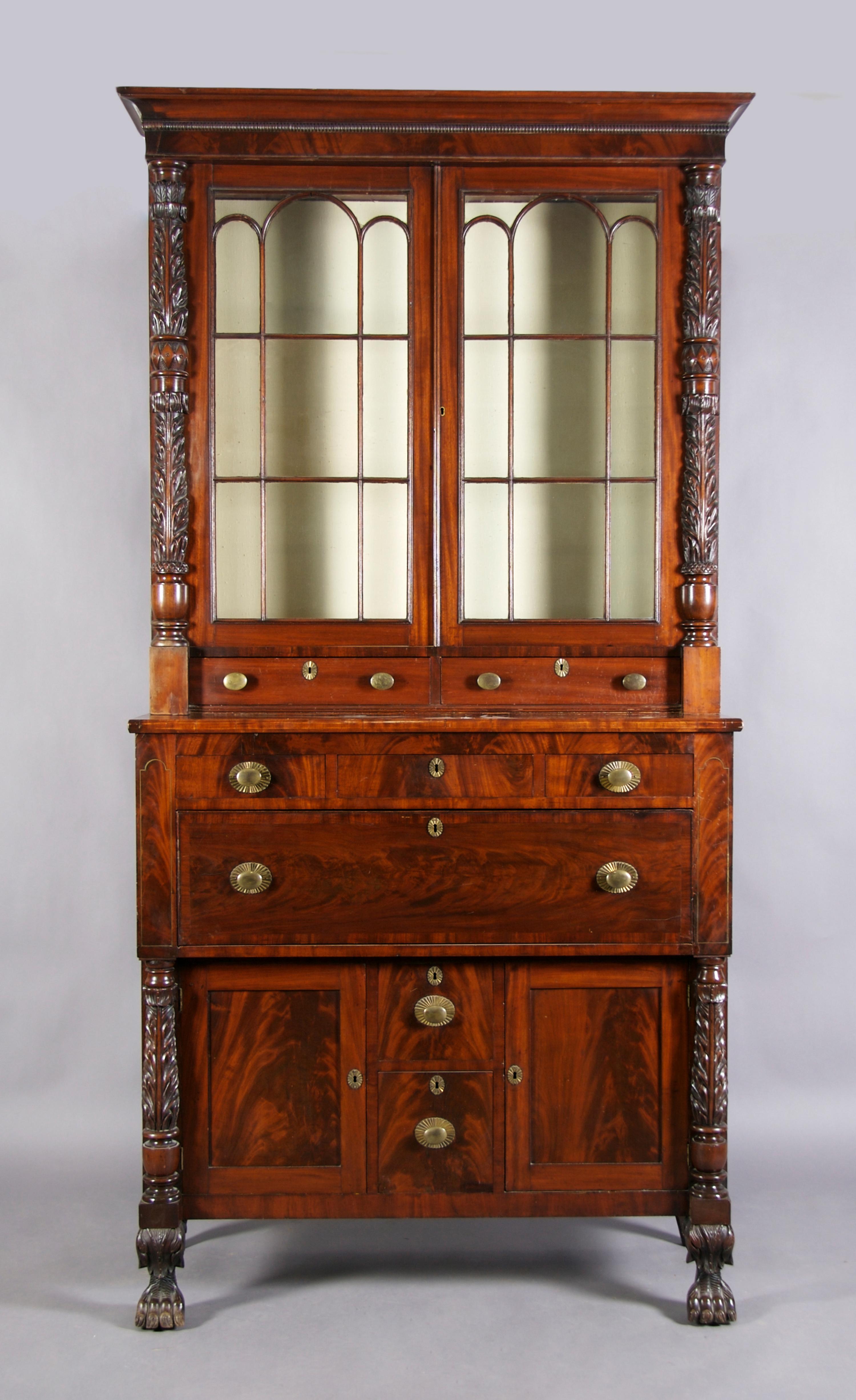 An American Mahogany Federal Secretary Bookcase, Height 100 x width 49 x depth 21 1/2 inches.
