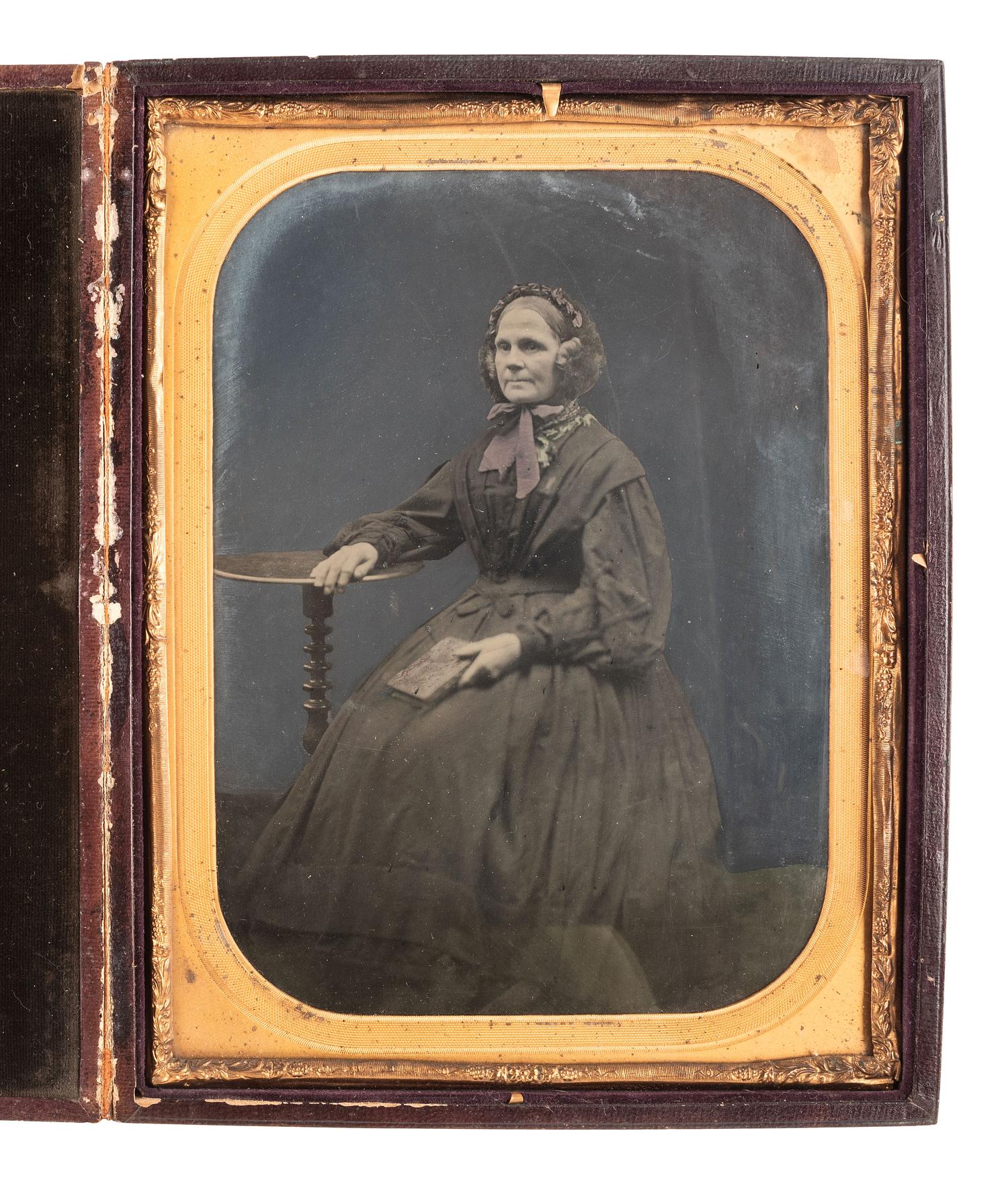 [EARLY PHOTOGRAPHY]. Whole plate ambrotype of aged woman & half plate ambrotype of aged gentleman.