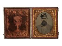 [CIVIL WAR]. Sixth plate tintype of Corporal Tappan S. Eaton, Company K, 35th Massachusetts Volunteer Infantry, WIA Antietam, 17 September 1862.