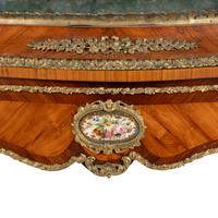 A French Kingwood, Tulipwood, Gilt Bronze and Porcelain Mounted Jardinière Table