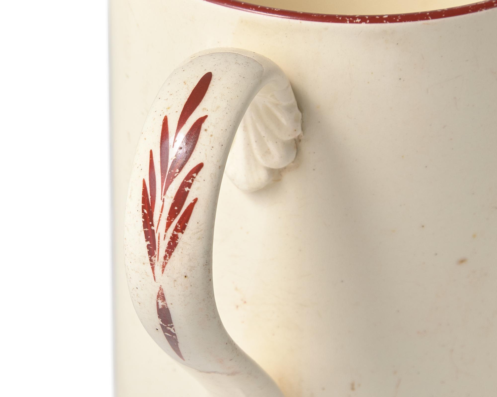 A Creamware Transfer-Decorated 'Courtship and Matrimony' Mug
