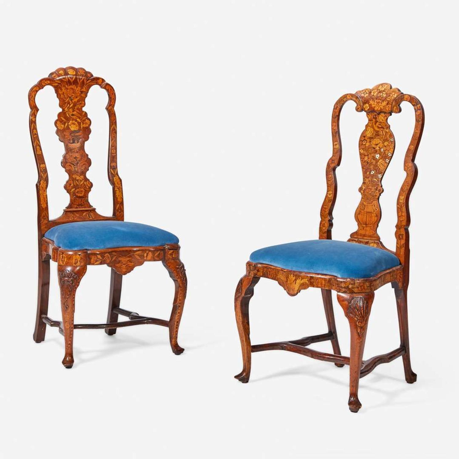 An assembled pair of Dutch Rococo inlaid walnut and marquetry side chairs circa 1750