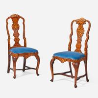 An assembled pair of Dutch Rococo inlaid walnut and marquetry side chairs circa 1750