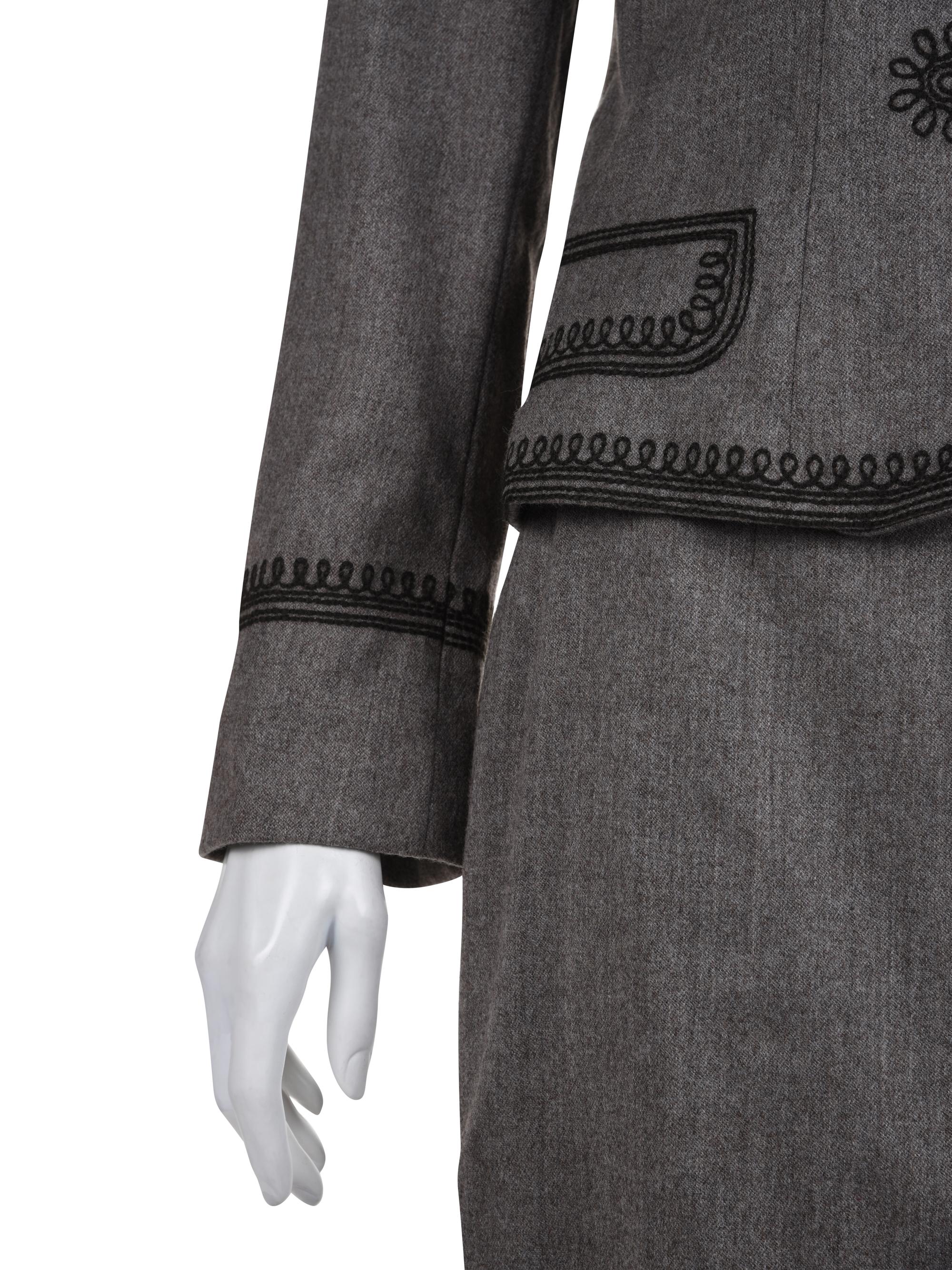 Three Designer Skirt Suits: One Gianni Versace, One Oscar de la Renta, and One Moschino, 1990s