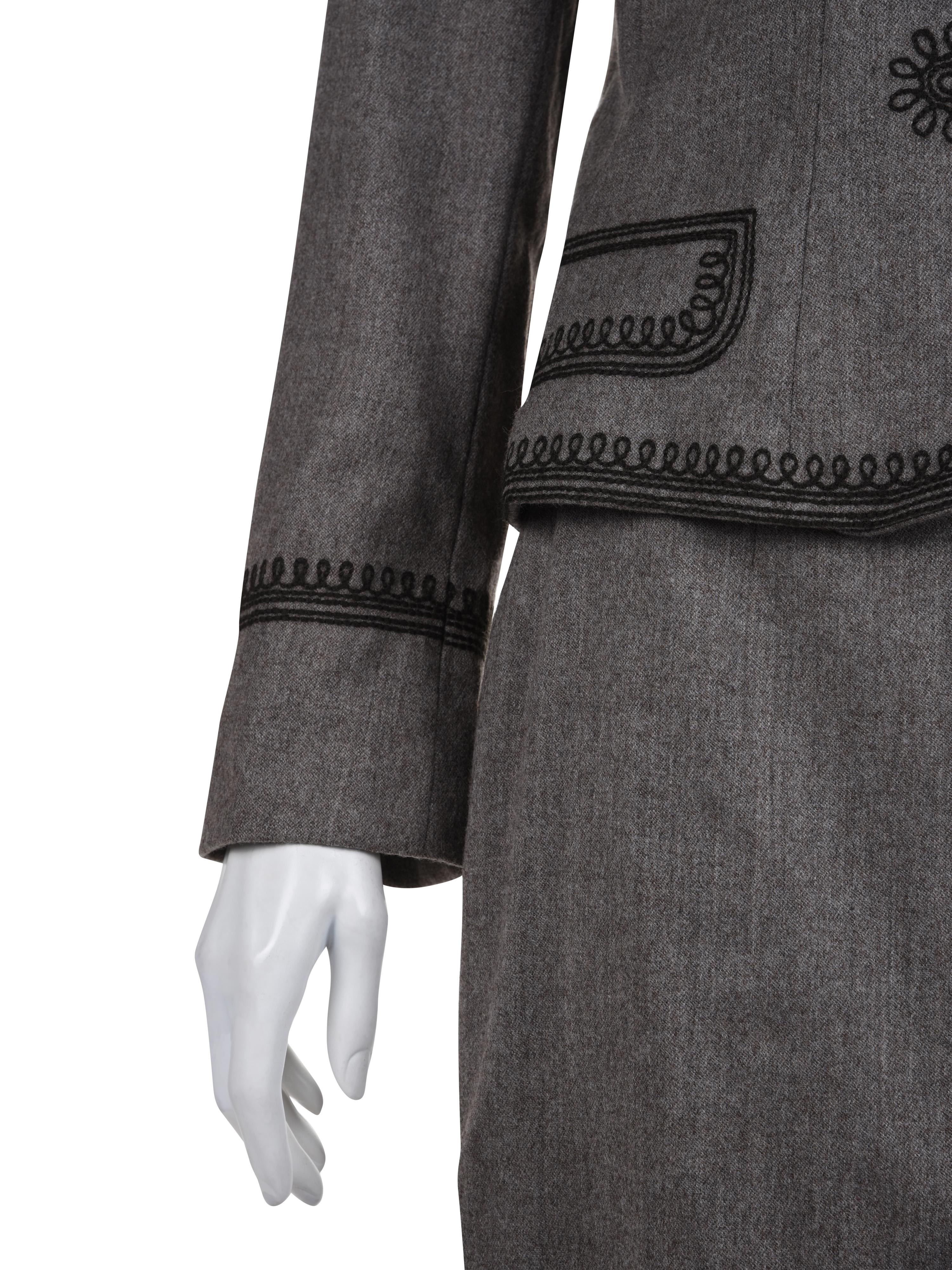 Three Designer Skirt Suits: One Gianni Versace, One Oscar de la Renta, and One Moschino, 1990s