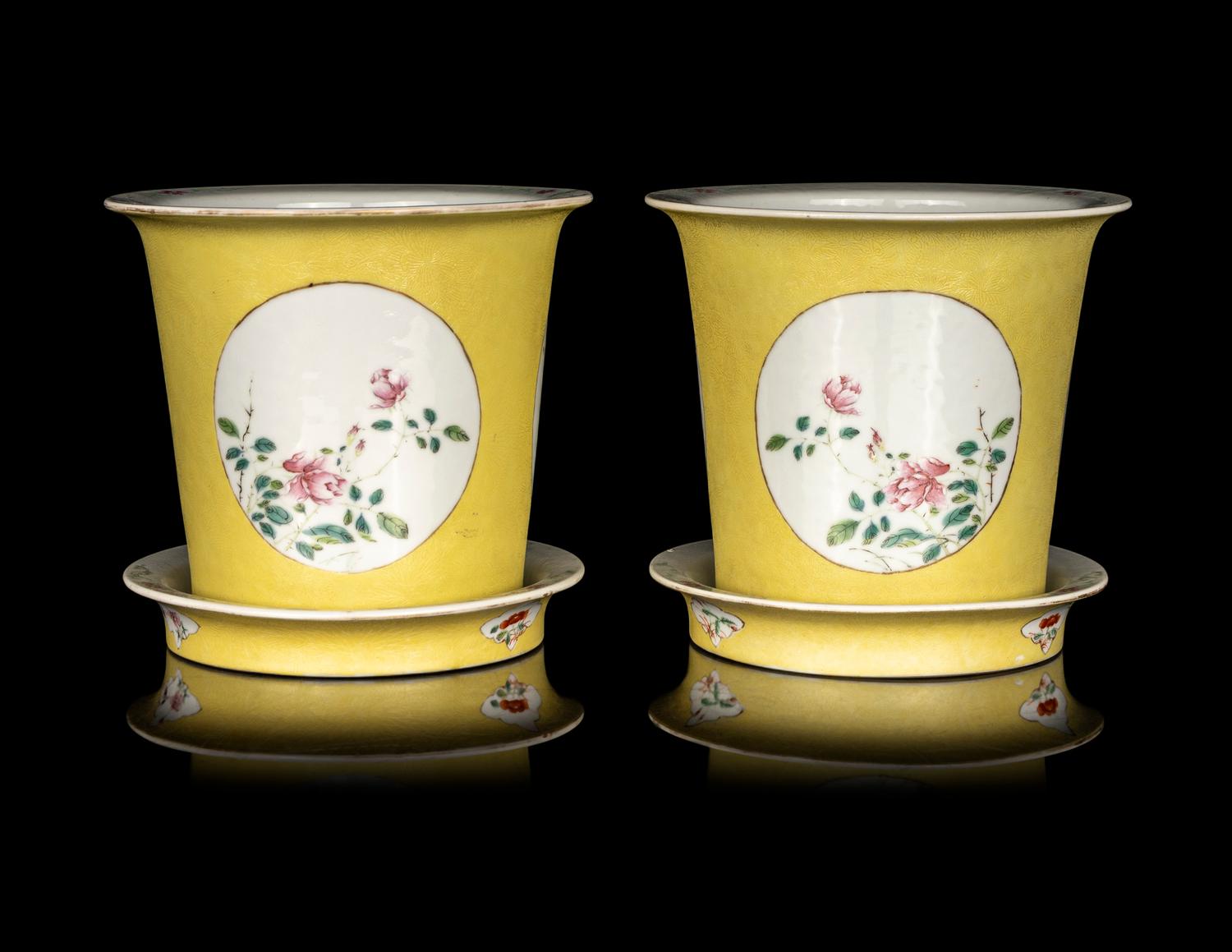 A Pair of Chinese Yellow Ground Famille Rose Cache Pots and Undertrays