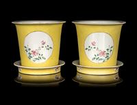 A Pair of Chinese Yellow Ground Famille Rose Cache Pots and Undertrays