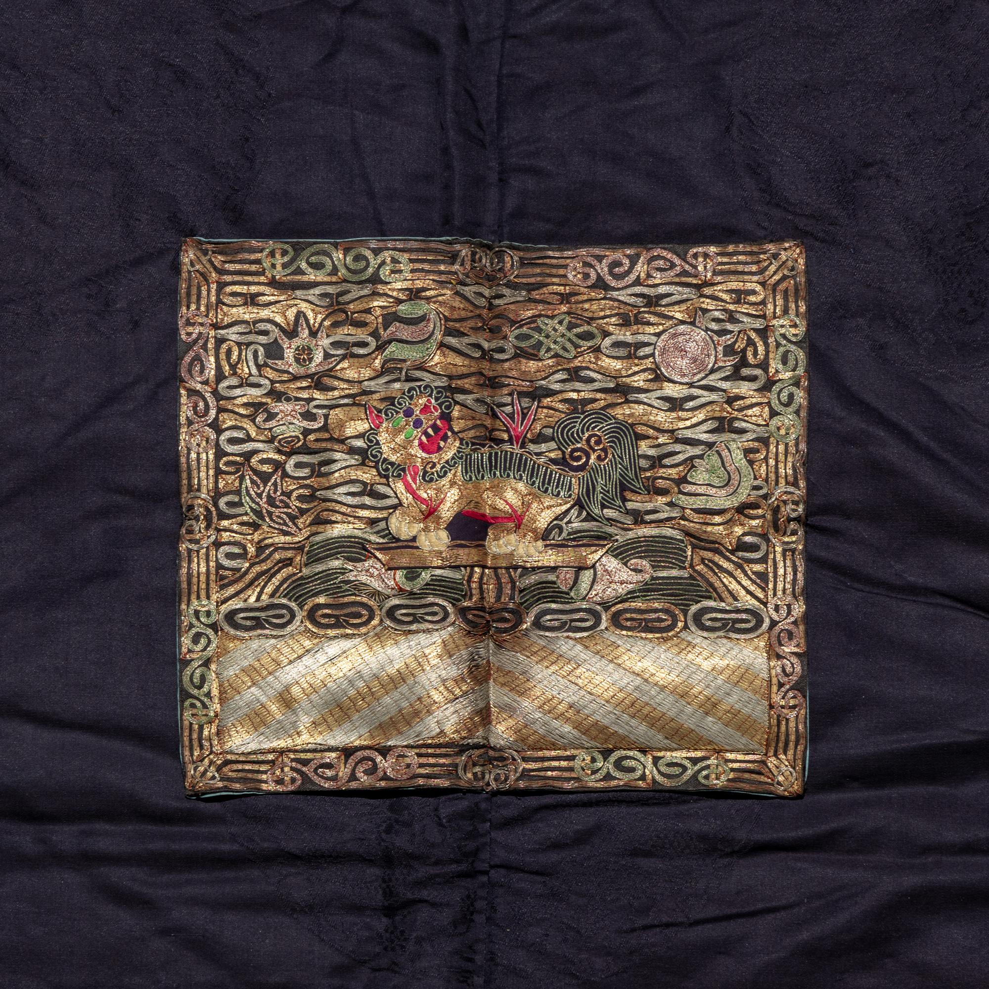 A Chinese Dark Blue Silk Fur Lined Official's Robe, Bufu , Late Qing Dynasty — 清晚期 石青地四品武官冬補服