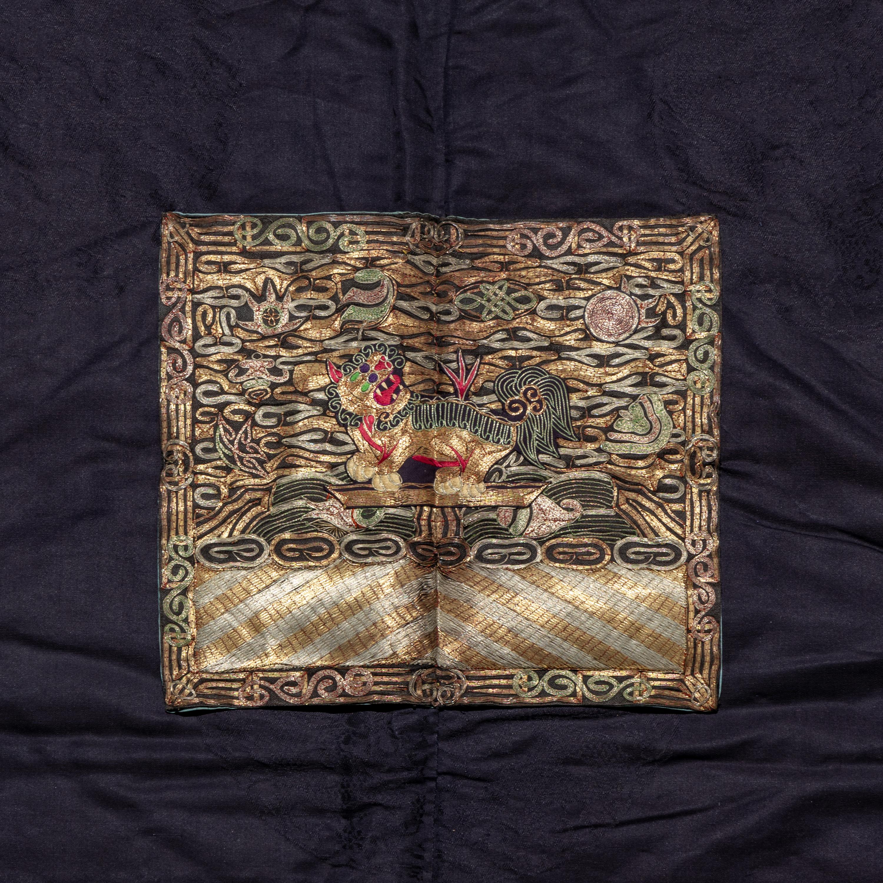 A Chinese Dark Blue Silk Fur Lined Official's Robe, Bufu , Late Qing Dynasty — 清晚期 石青地四品武官冬補服