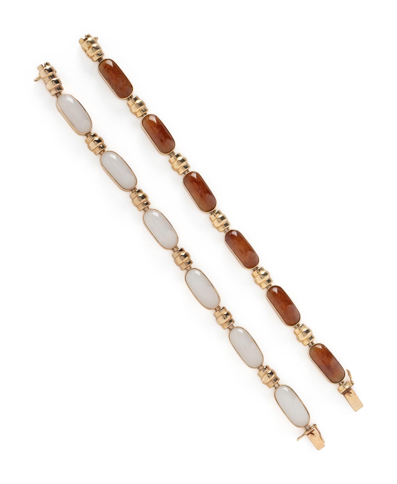 TWO YELLOW GOLD AND JADE BRACELETS