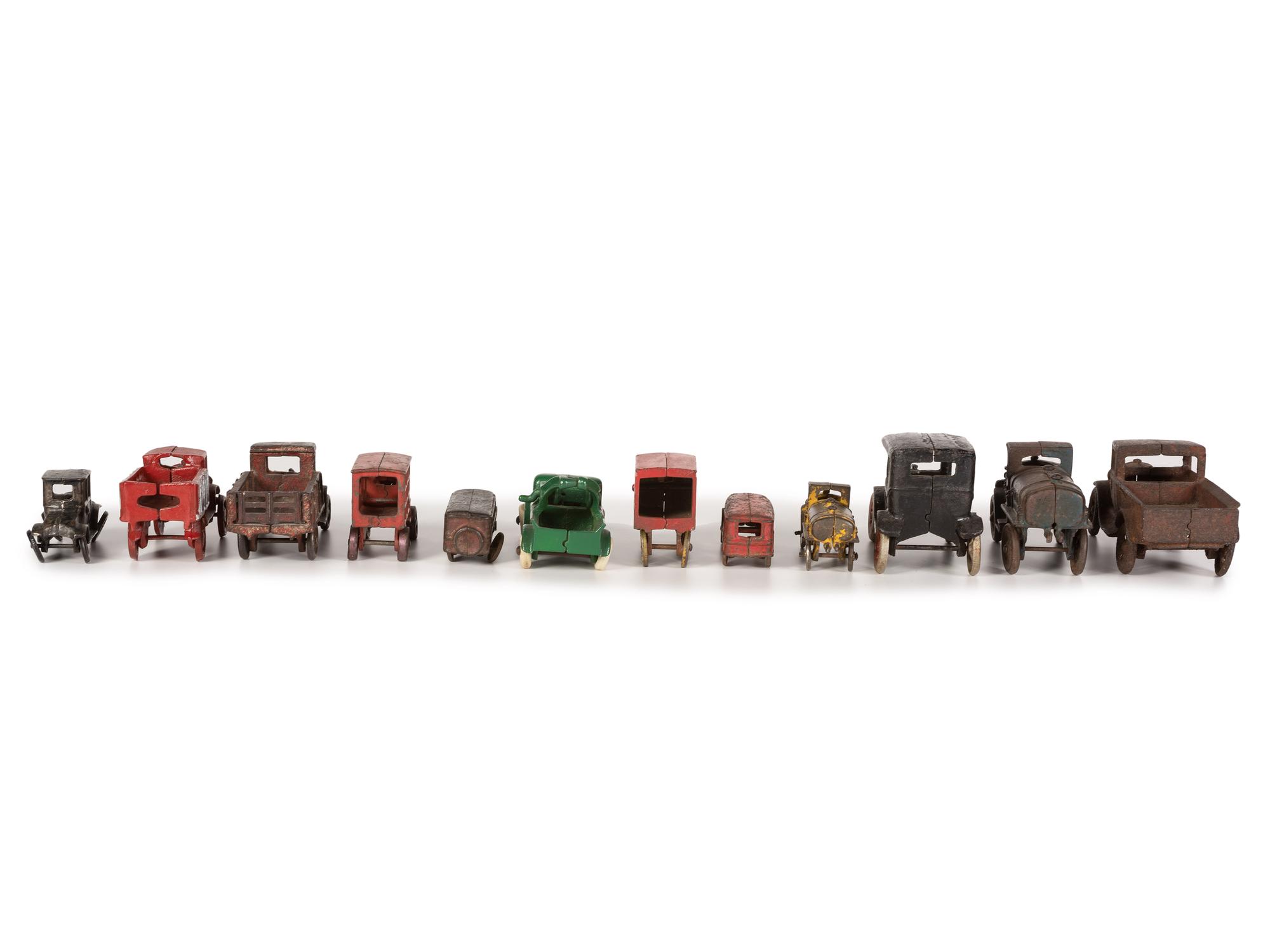 Twelve Painted Cast Iron Toy Cars, Trucks, and Buses