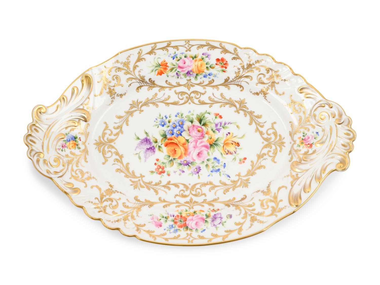 A French Parcel Gilt and Hand Painted Porcelain Tureen