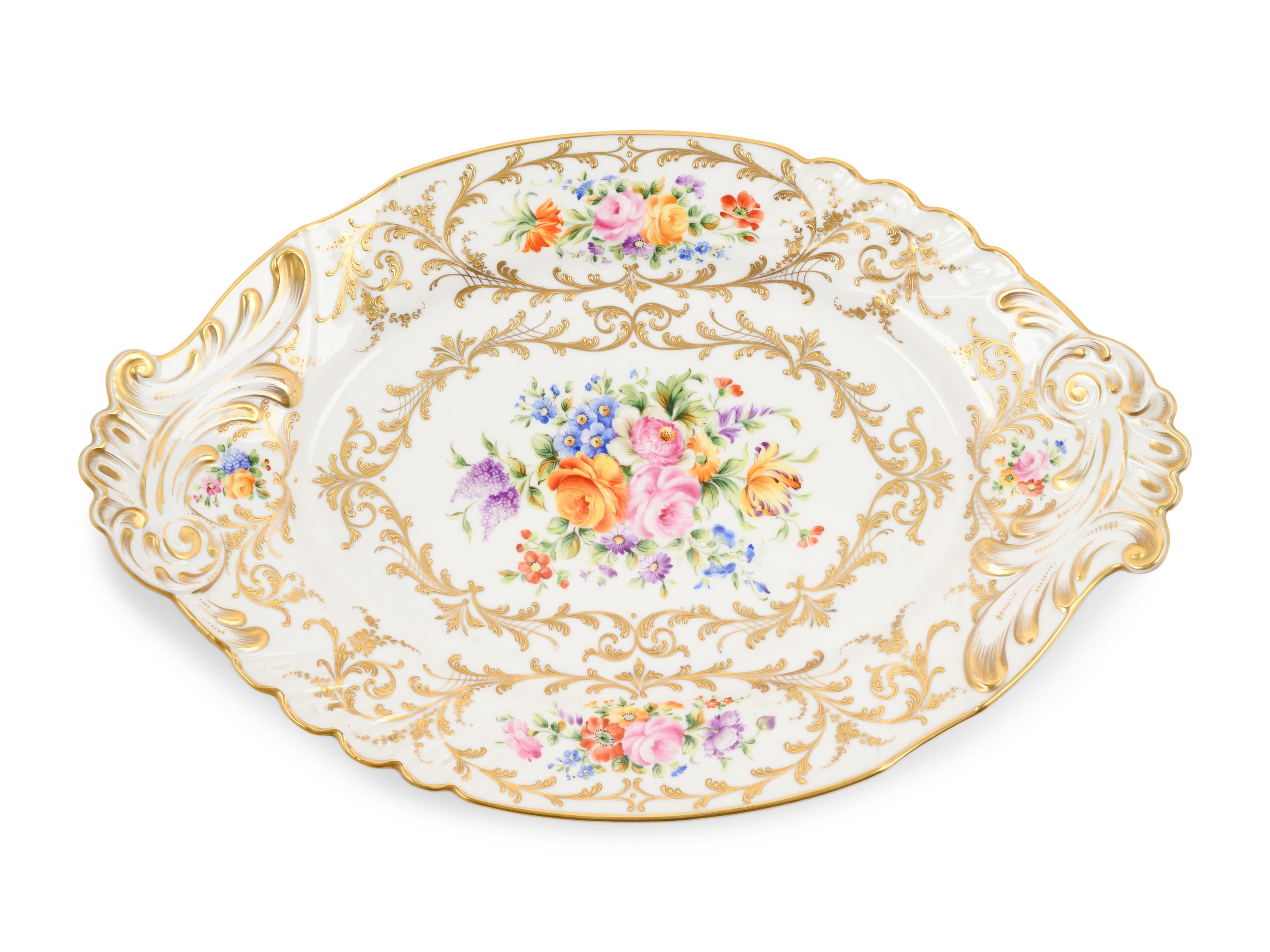A French Parcel Gilt and Hand Painted Porcelain Tureen