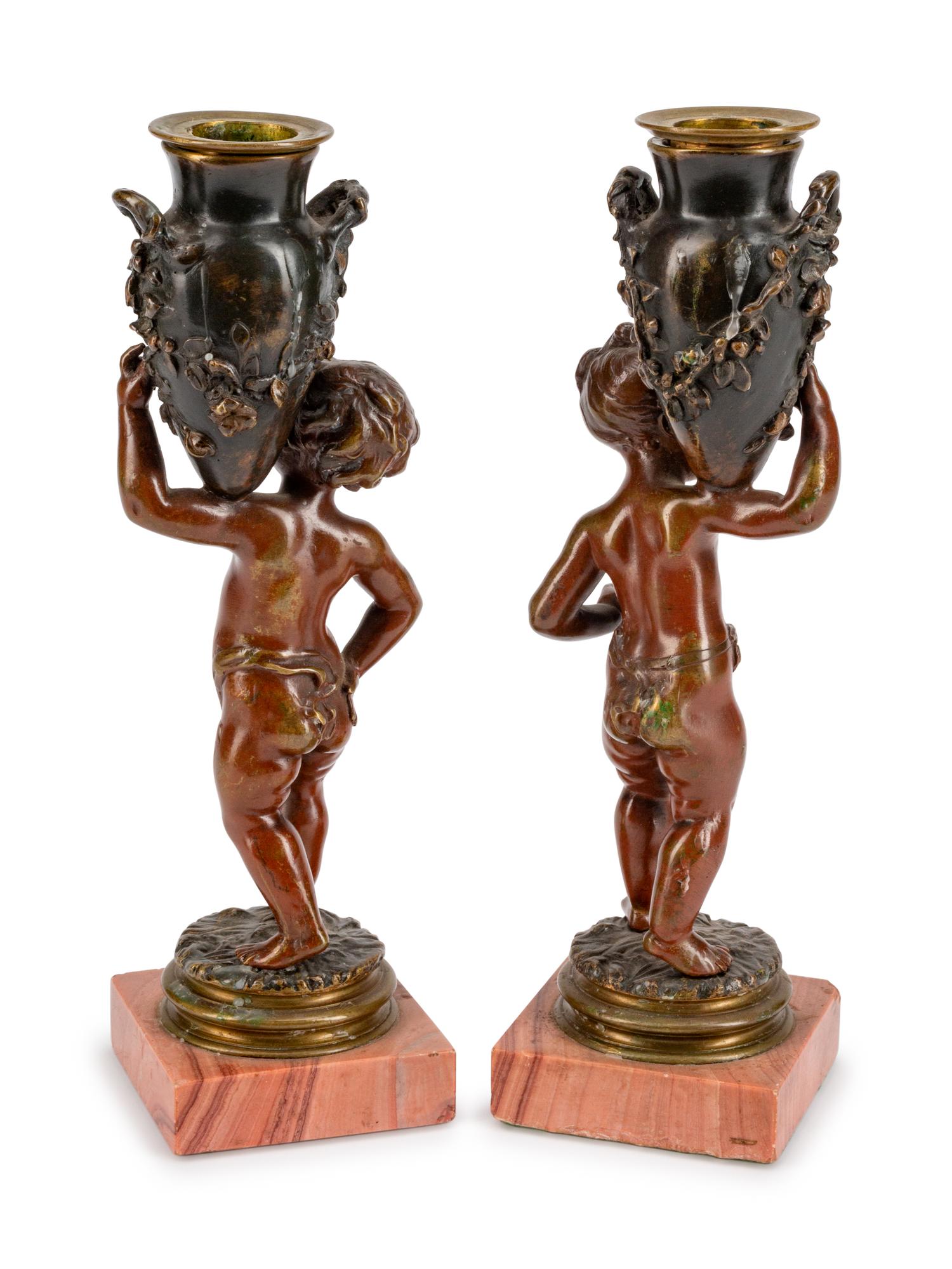 A Pair of French Patinated Bronze Figures of Infant Water Carriers — CIRCA 1900