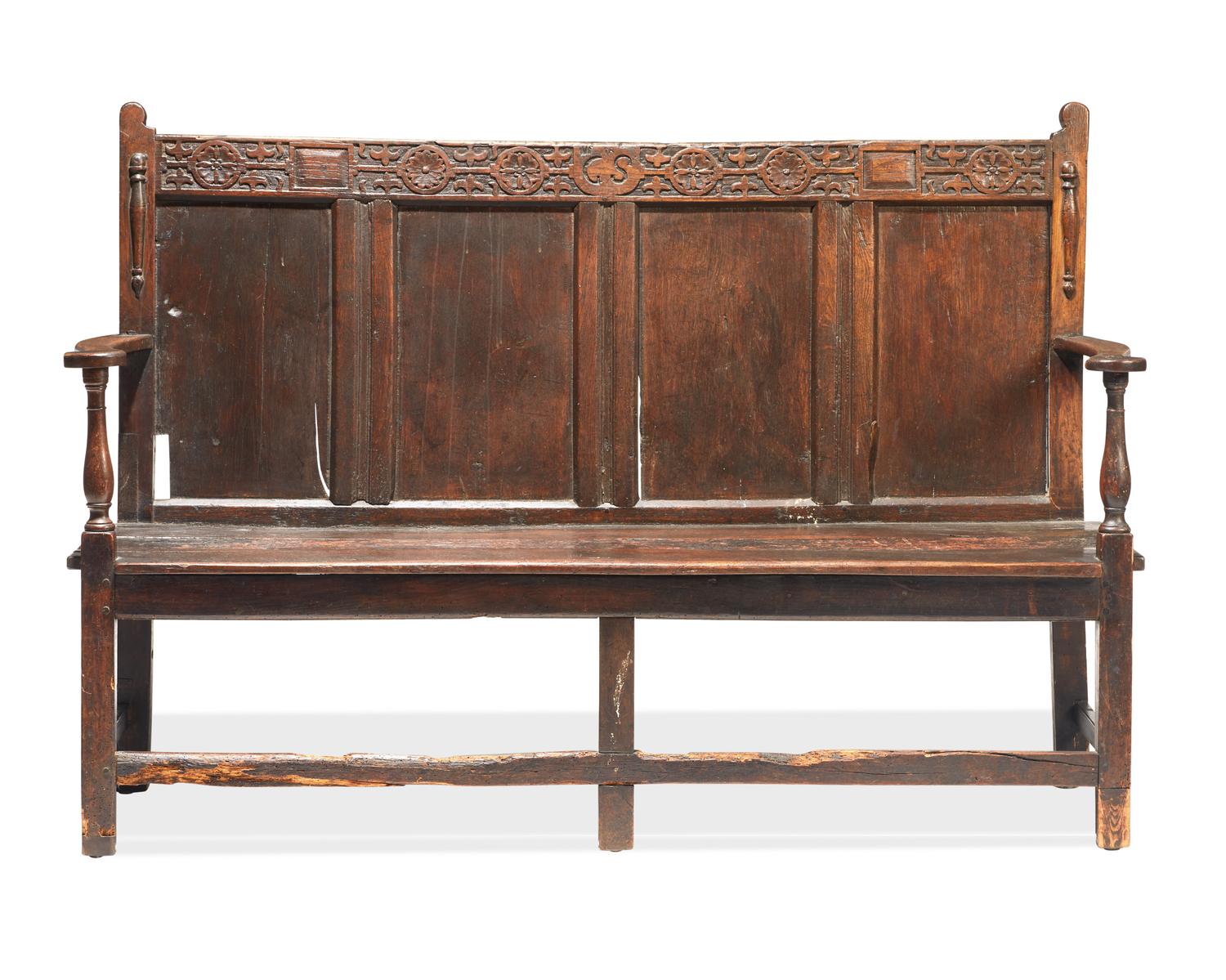 A James II Carved Oak Settle