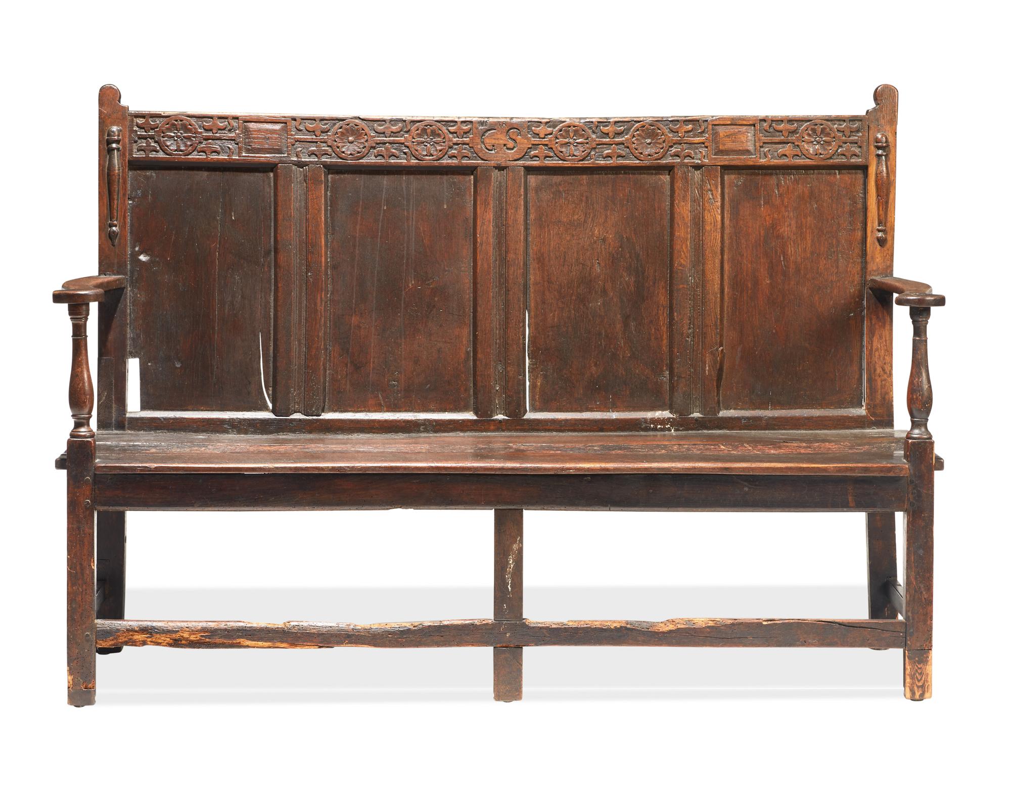 A James II Carved Oak Settle