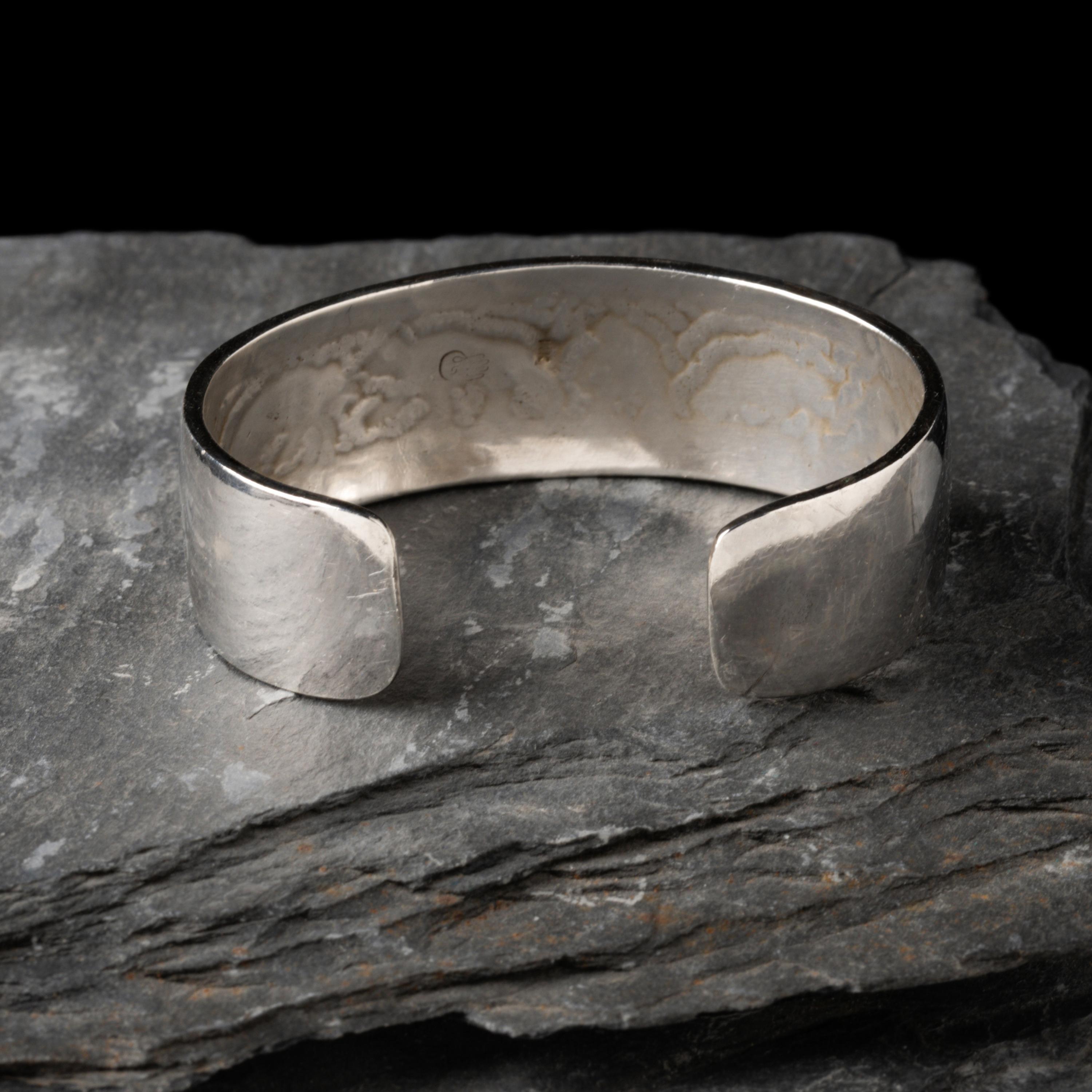 Watson Honanie (Hopi, 1953-2023) — Sterling Silver with 14K Gold Overlay Cuff Bracelet, with Bear Scene