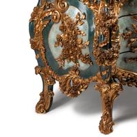An Italian Carved, Painted and Parcel Gilt Commode