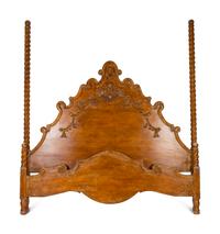 A Spanish Colonial Style Carved Walnut Bed with headboard