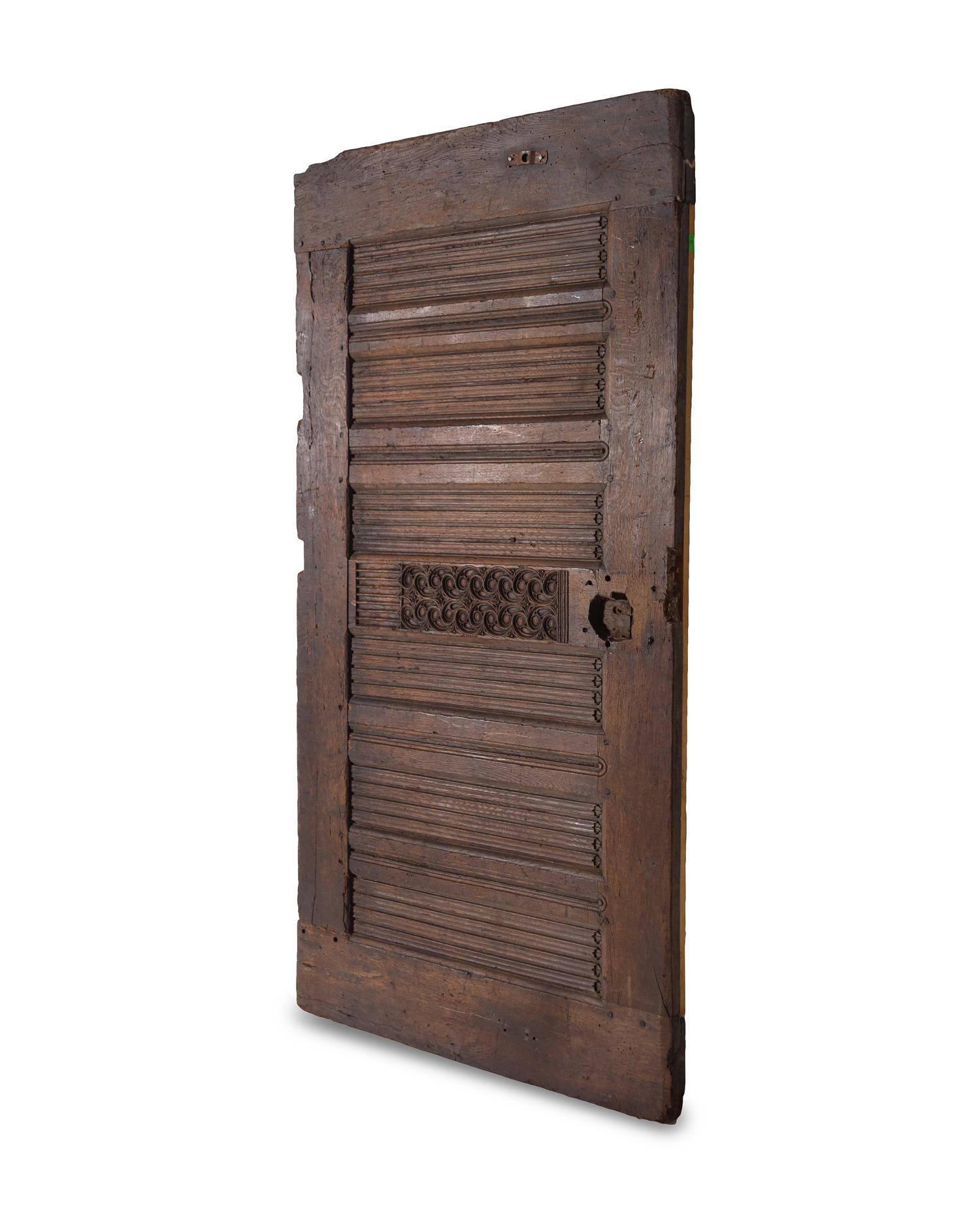 A Gothic Style Linenfold-Carved Oak Door