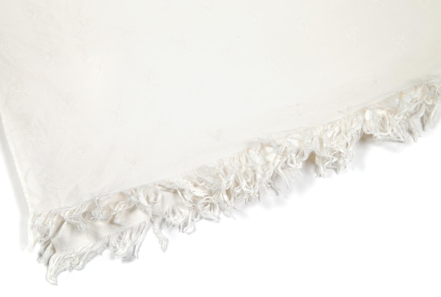 An Hermès Cream Wool and Silk Jacquard Scarf, 55.5" x 35".