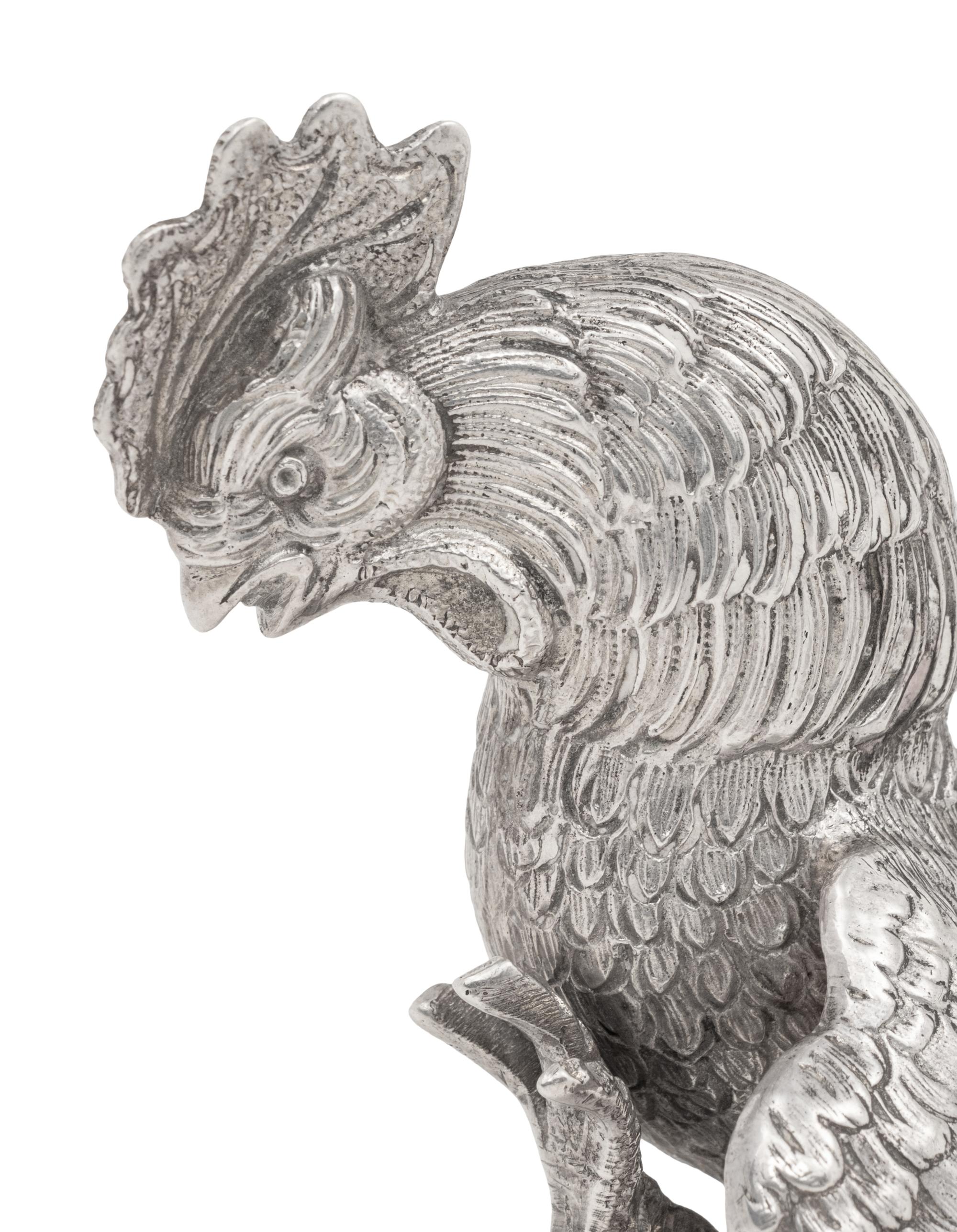 A Pair of Continental Silver Cockerels