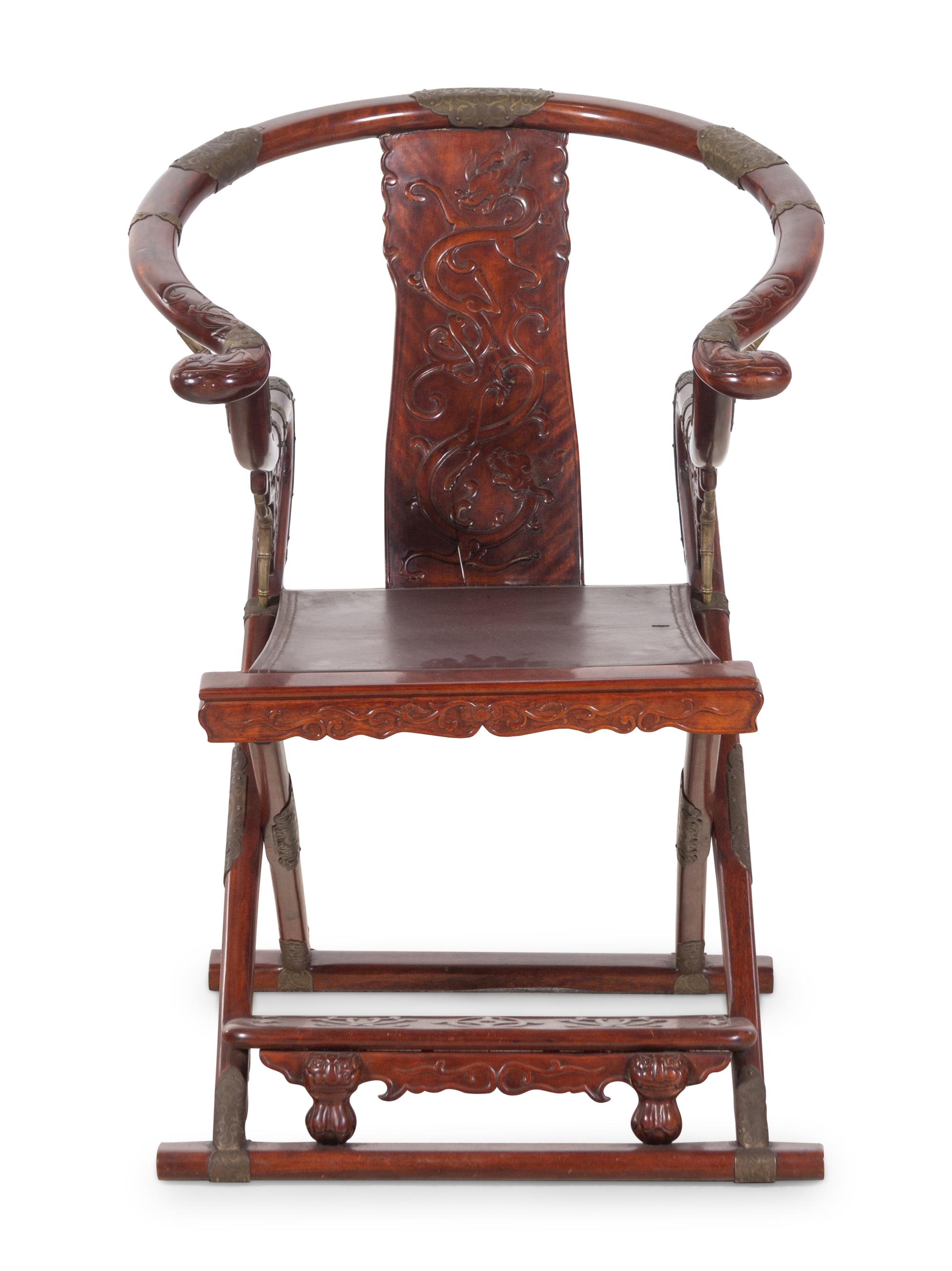 A Chinese Possibly Huanghuali Wood Folding Armchair, Jiaoyi