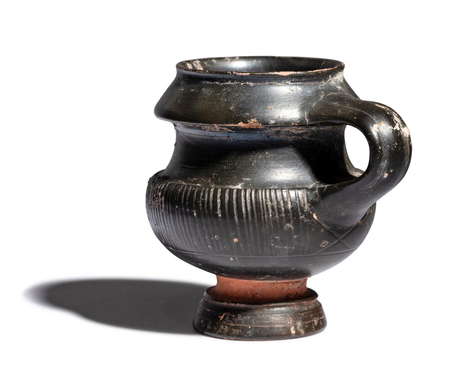 An Apulian Black-Glazed Oinochoe