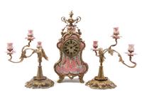 A German Porcelain and Gilt Metal Mounted Clock Garniture, Lenzkirch, Height of clock 18 inches.