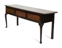 A Queen Anne Oak Three Drawer Sideboard