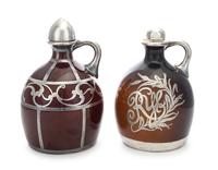 Two American Porcelain and Silver Overlay Liquor Bottles, , comprising an example with silver overlay worked to show a rye plant cartou