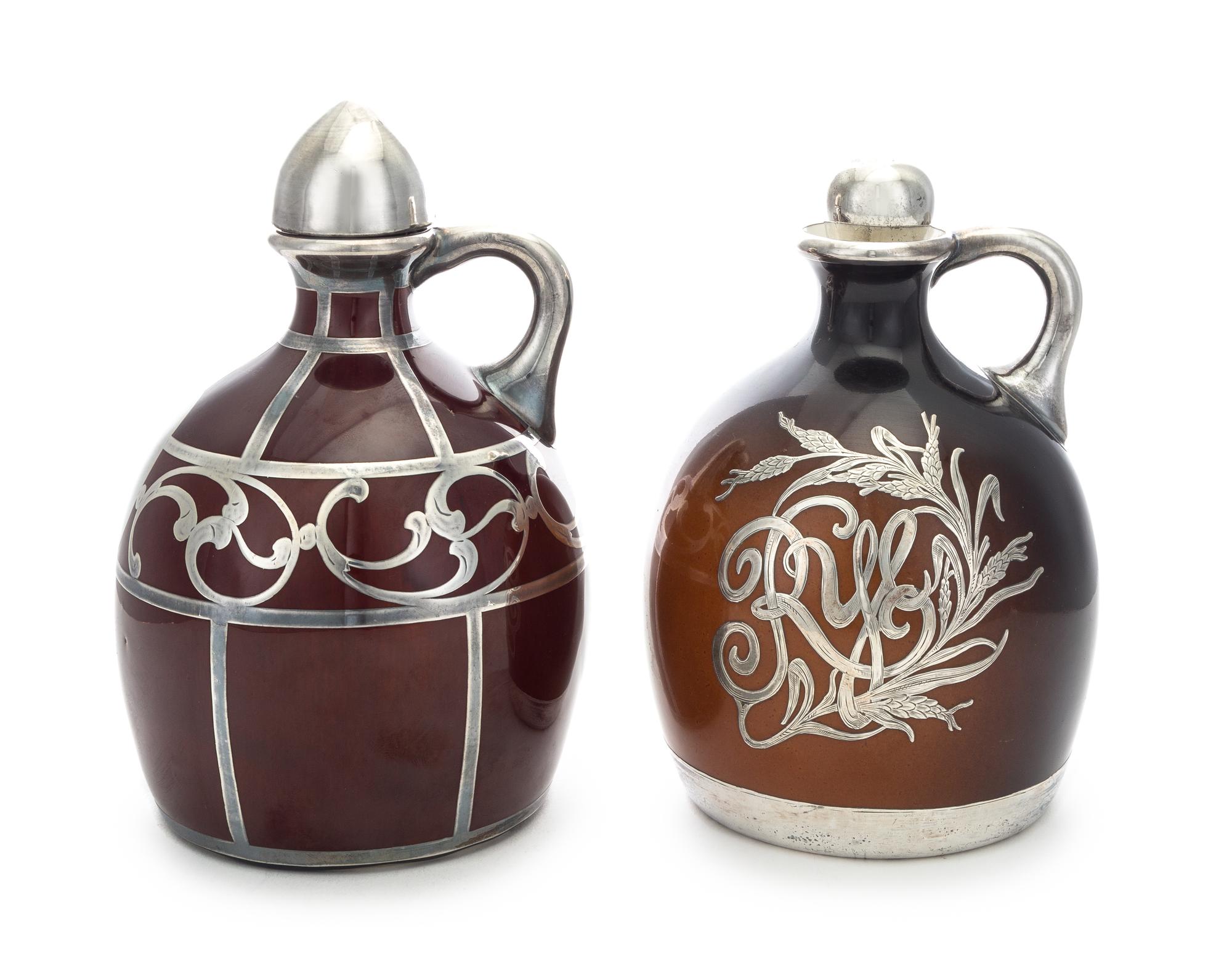 Two American Porcelain and Silver Overlay Liquor Bottles, , comprising an example with silver overlay worked to show a rye plant cartou