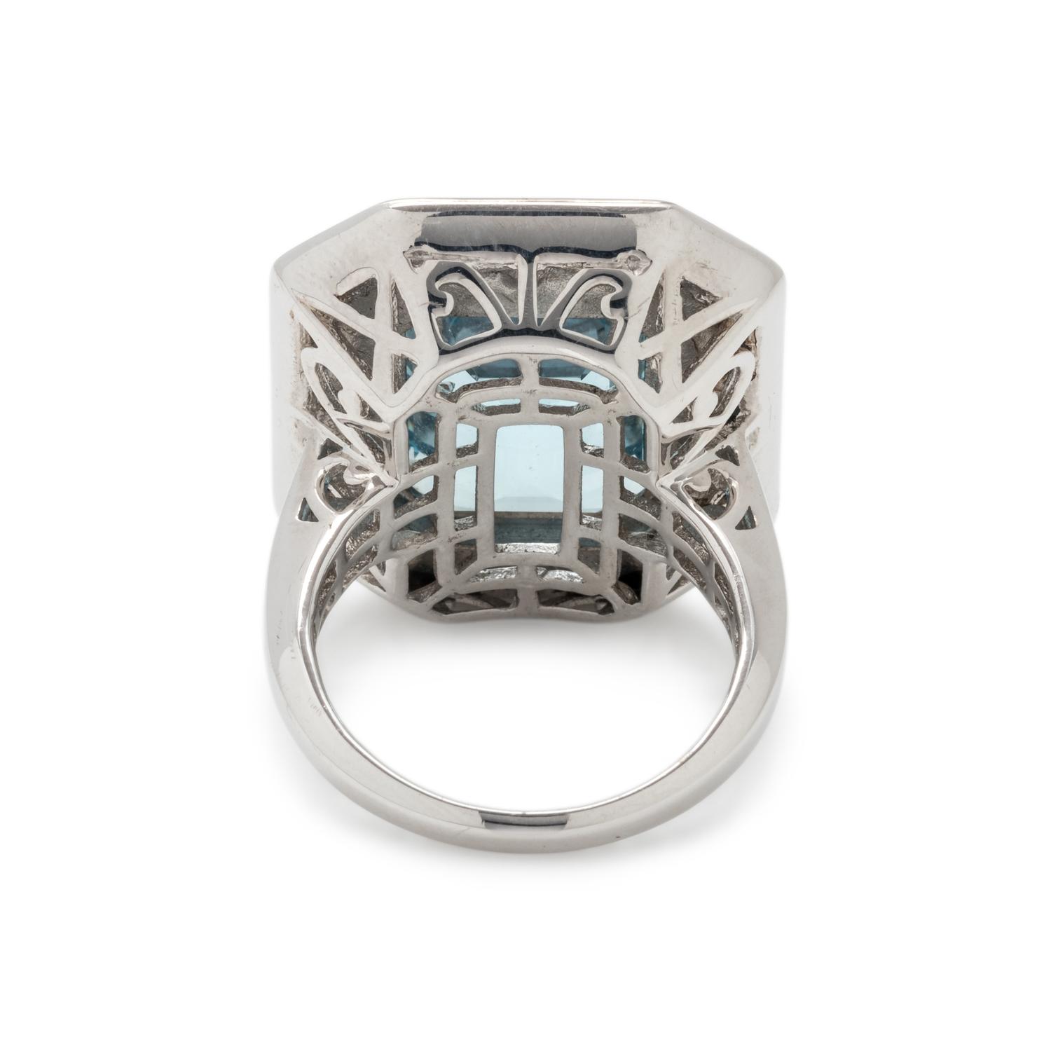 BLUE TOPAZ AND ONYX RING